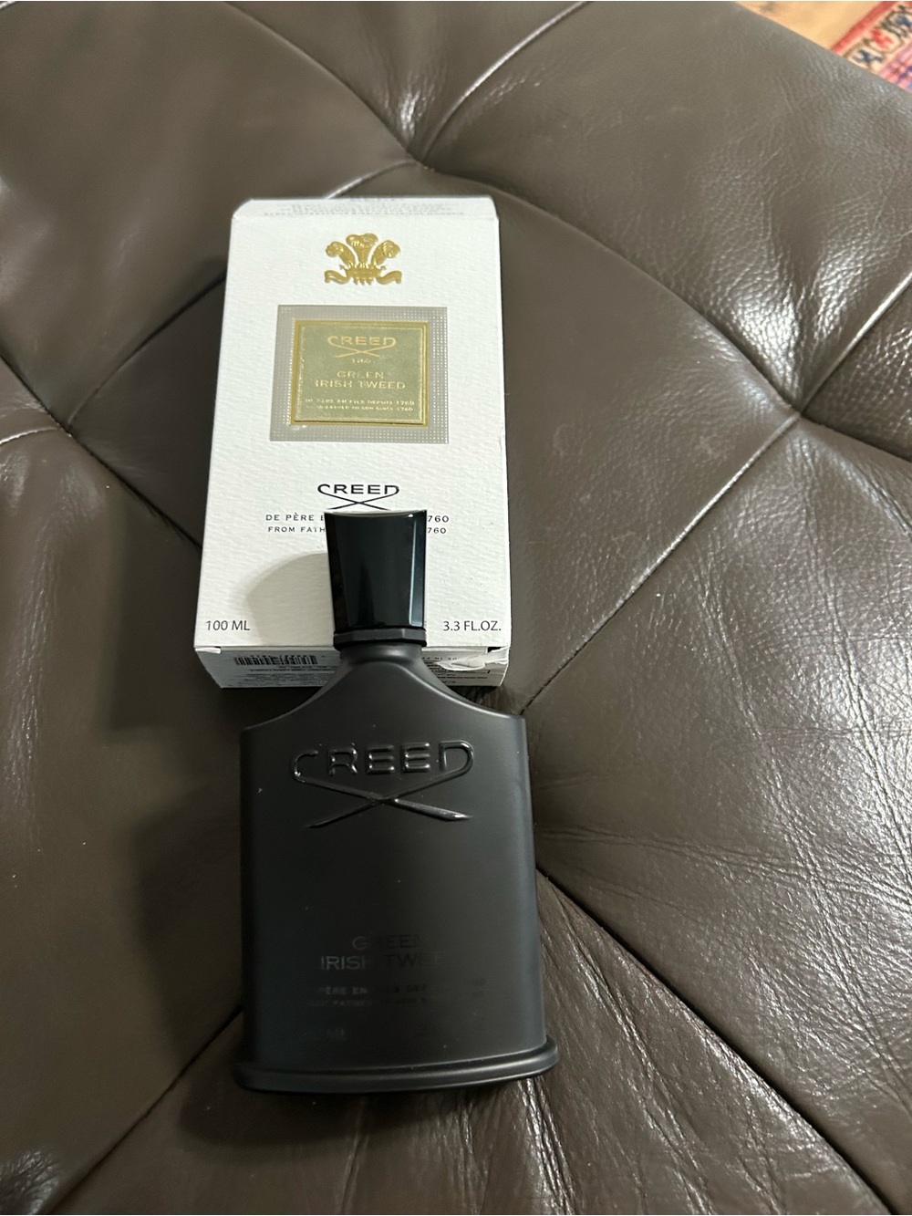 Creed Black Bottle with White and Gold Box